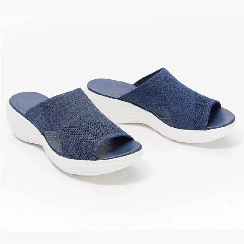 Paire de claquettes orthopédiques