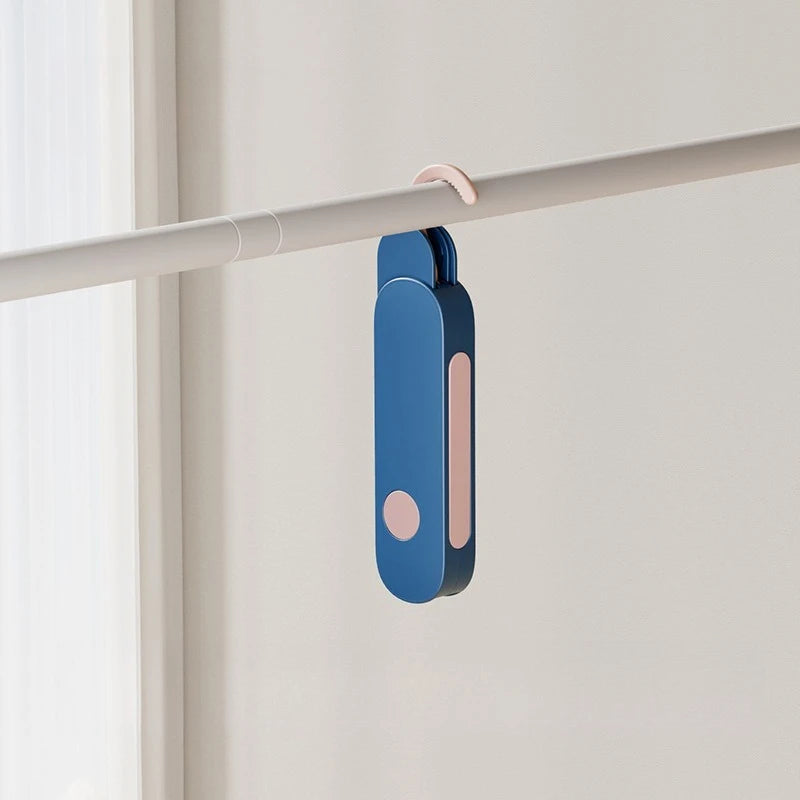 Cintre de Voyage Pliable 7 Accroches – Compact & Pratique